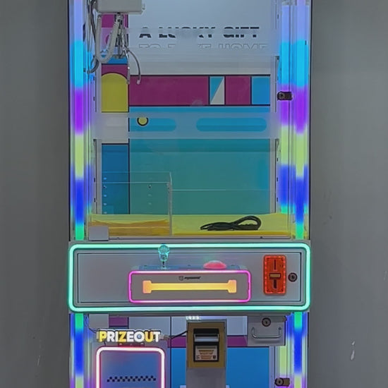 Máquina cazapeluches Lucky Gift azul: vistas del gabinete, controles y mecanismo.