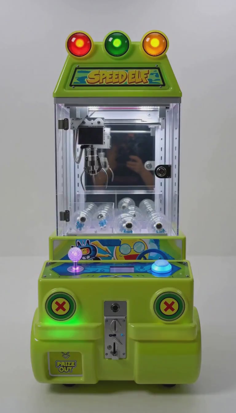 Máquina Speed Elf de clips verde: vistas del gabinete y funcionamiento.