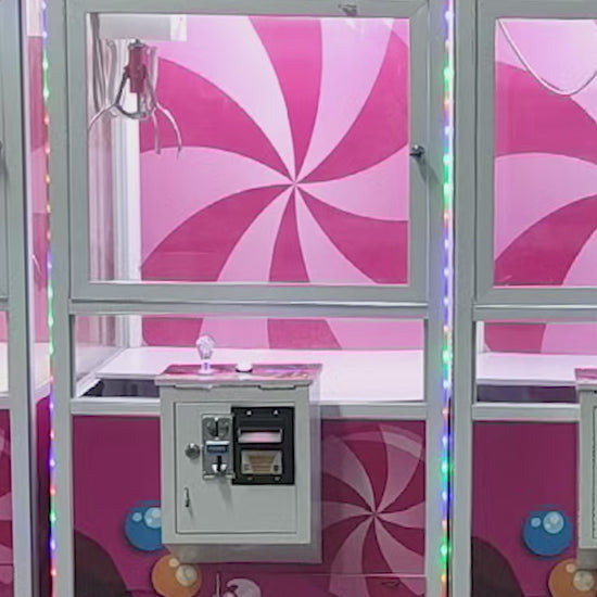 Máquina Candy Station: vistas del gabinete y funcionamiento.
